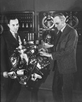 1934 Edsel and Henry Ford with early V8 engine